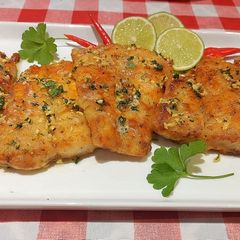 A picture of Pan seared fish with garlic herbed butter sauce.