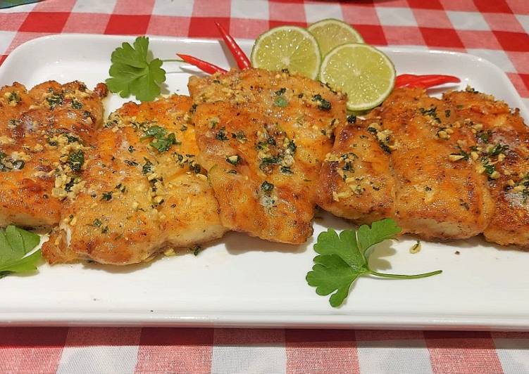 Pan seared fish with garlic herbed butter sauce