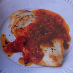 A picture of Flattened Chicken with Tomato Sauce.