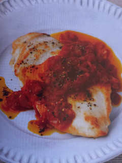 A picture of Flattened Chicken with Tomato Sauce.