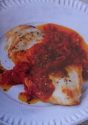 A picture of Flattened Chicken with Tomato Sauce.