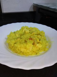 Una foto de Arroz caldoso con pollo