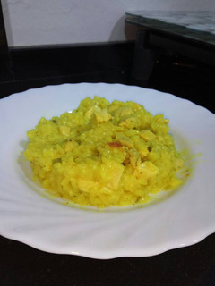 Una foto de Arroz caldoso con pollo