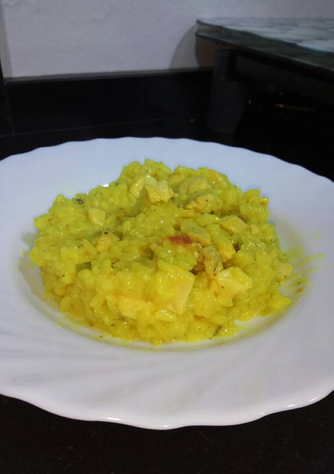 Una foto de Arroz caldoso con pollo
