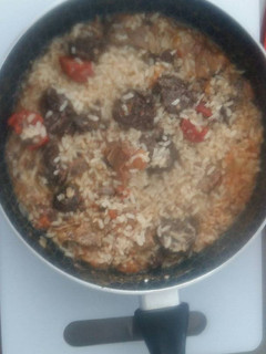 Una foto de Arroz con presa y embutidos