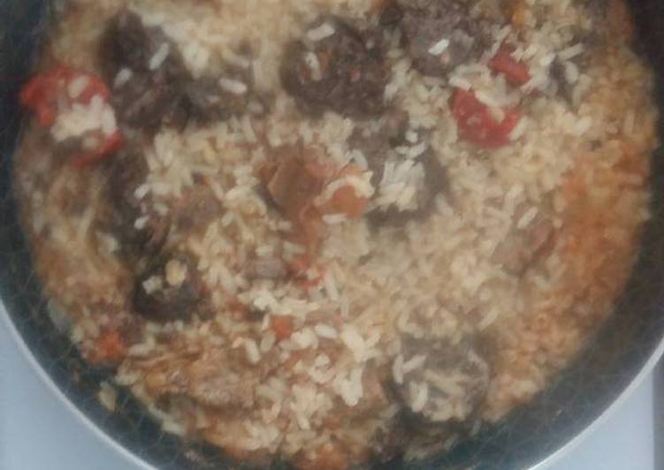 Arroz con presa y embutidos