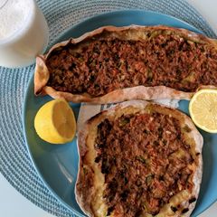 A picture of Lahmacun - Turkish minced lamb pitta/pizza.