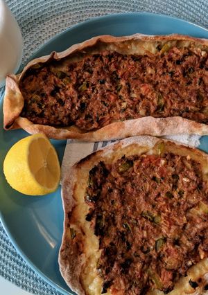 A picture of Lahmacun - Turkish minced lamb pitta/pizza.