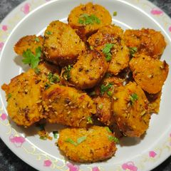 A picture of Gujarati style mix veg n mix flour Muthiya - A healthy home style classic.