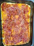 Pizza esponjosa alta
