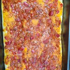 Una foto de Pizza esponjosa alta
