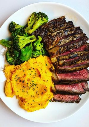 A picture of Rib Eye with Sweet Potato Mash.