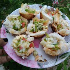 A picture of Pizza cups in Appam Patra.