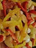 Pollo con papas y pimientos