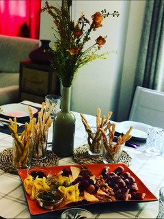 Una foto de Tabla de aperitivos con grissini caseros de sabores