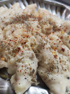 A picture of White sause pasta.
