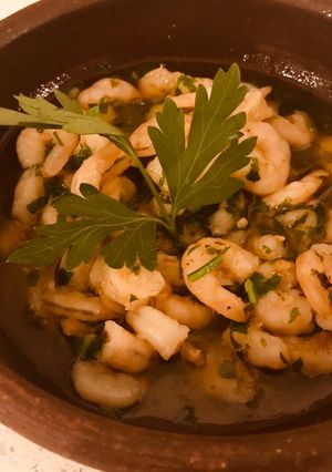 Una foto de Camarones al pil pil