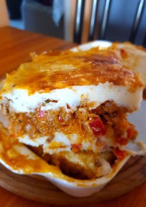 Una foto de Pastel de papa, carne y calabacín