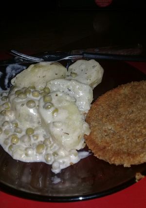 Una foto de Papas hervidas con crema