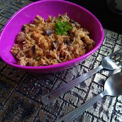 A picture of Schezwan mushroom fried rice.
