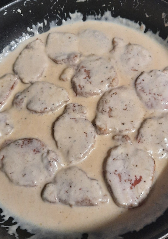 Una foto de Solomillo de cerdo con salsa de Queso
