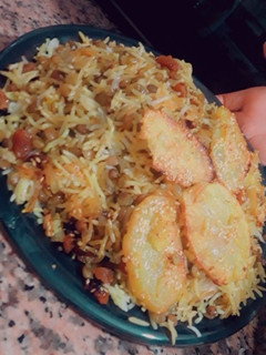 عکسی از دستور عدس پلو با کشمش