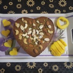 A picture of Two in one cake Samolina mango and banana wheat cake.