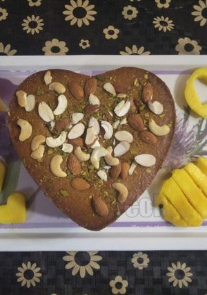 A picture of Two in one cake Samolina mango and banana wheat cake.
