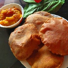 A picture of Rajgira singada poori with Aloo subji.