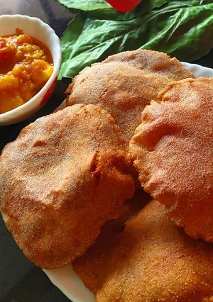 A picture of Rajgira singada poori with Aloo subji.