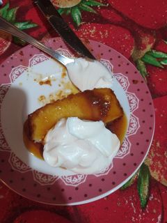 Una foto de Budín de pan con crema