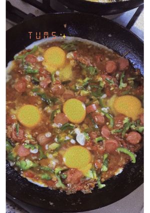 A picture of Shakshuka - Arab poached eggs.
