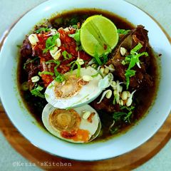 A picture of R A W O N (Brisket in Black Nut Sauce).