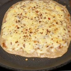 Pizza paratha A picture of Pizza paratha.