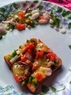 பிரட் பீடஂசா(Street food)(bread pizza recipe in tamil) செய்முறை முக்கிய புகைப்படம்