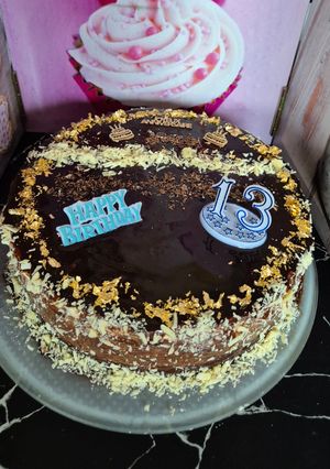 Une photo de Entremets trois chocolats croustillant praliné