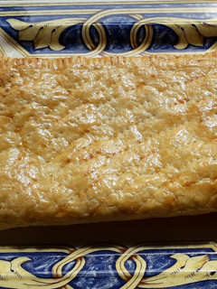 Una foto de Empanada de jamón serrano y cabello de ángel