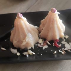 A picture of Kaju coconut modak.