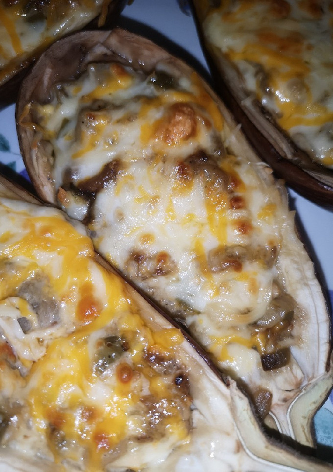 Una foto de Berenjenas rellenas de verdura y huevo
