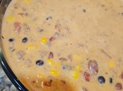 A picture of cheesy beef and bean soup