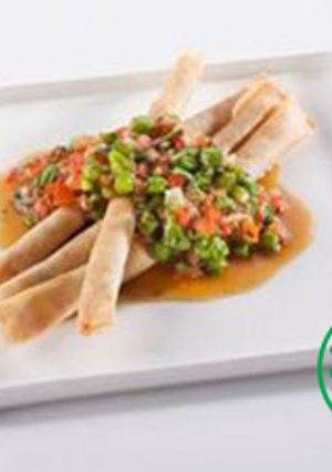 A picture of Oriental Chicken Cigar with Asparagus salsa.