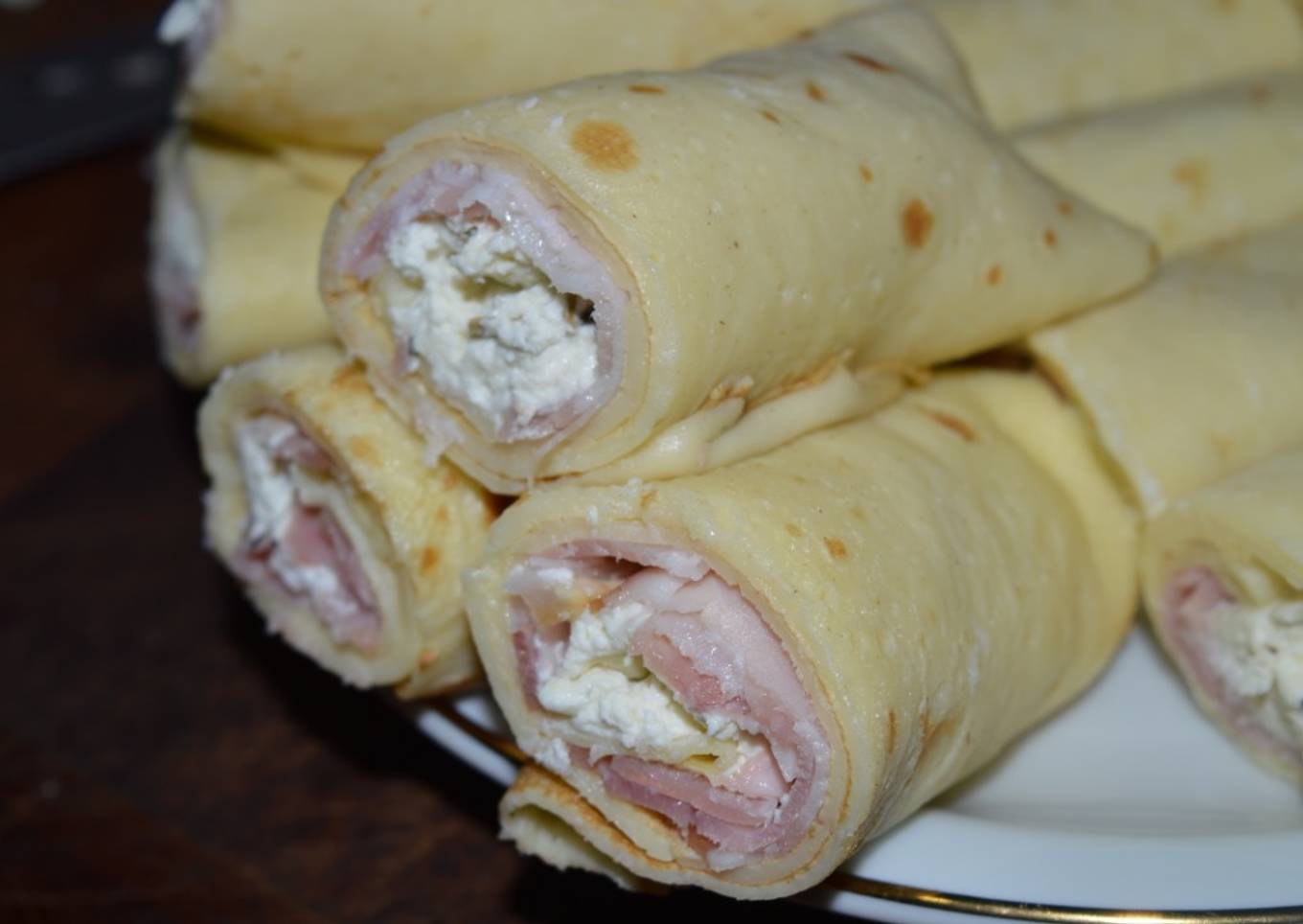 Rollitos de bacon con quesillo de ricotta