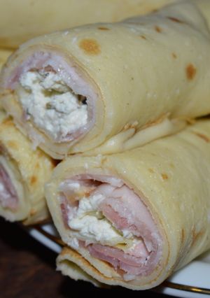 Una foto de Rollitos de bacon con quesillo de ricotta