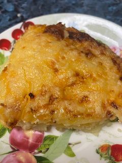 Una foto de Patatas gratinadas con queso en freidora de aire