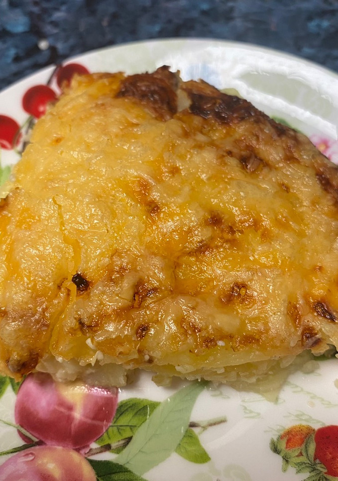 Una foto de Patatas gratinadas con queso en freidora de aire