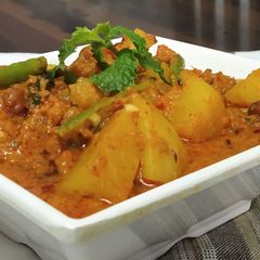 A picture of Aloo Chana Malai in Dhaba Style.