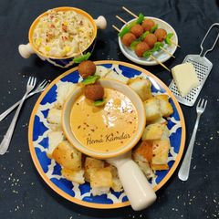 A picture of Pav Bhaji  Cheese Fondue with Cheeseballs.