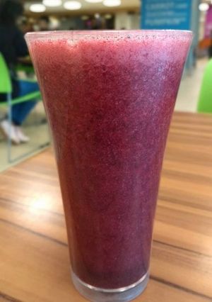 A picture of Grapes and beetroot juice.
