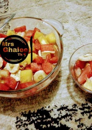 A picture of Fruits salad with mint leave sugar syrup.