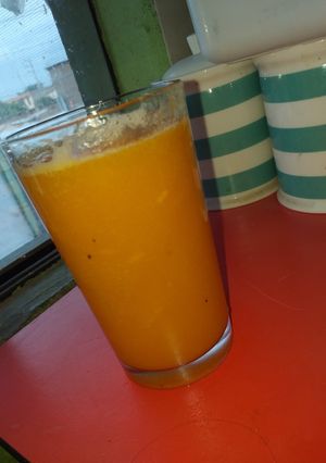 Una foto de Jugo de papaya. Así sin más